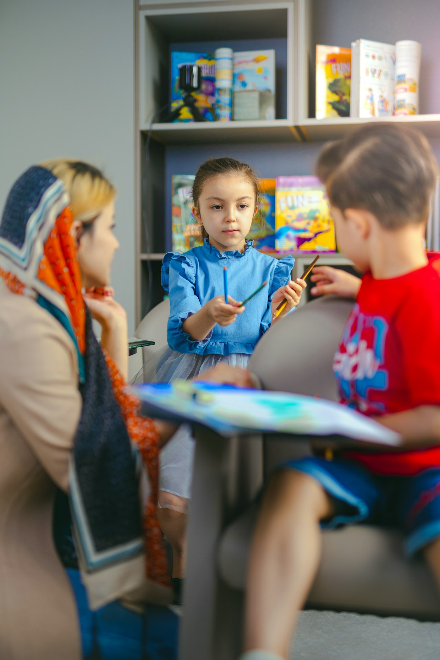 Educator warmly engaging with a young child